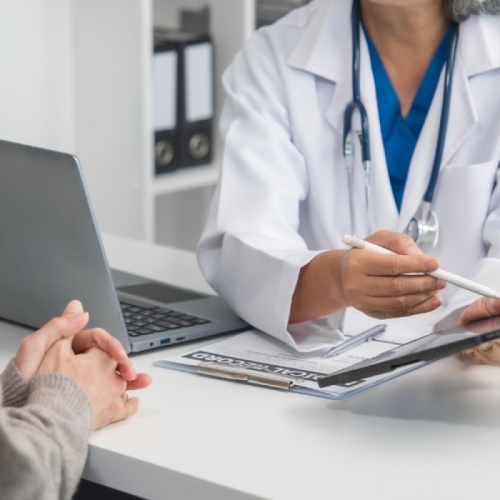 Doctor discussing esperal implant treatment with a patient in a London clinic
